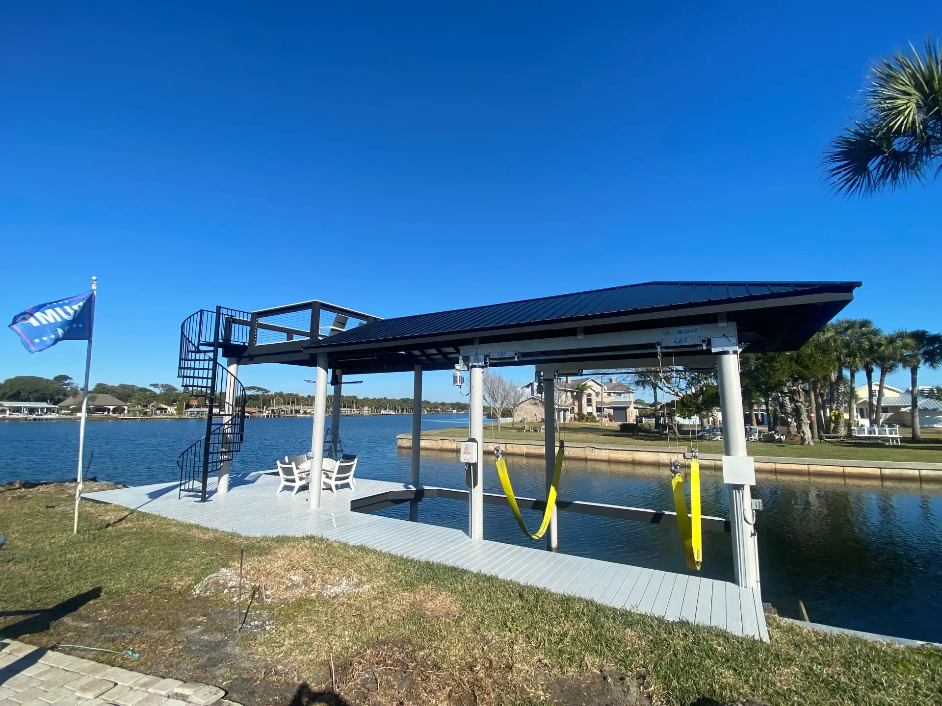 Boat house construction on the pvc deck with chairs on the florida