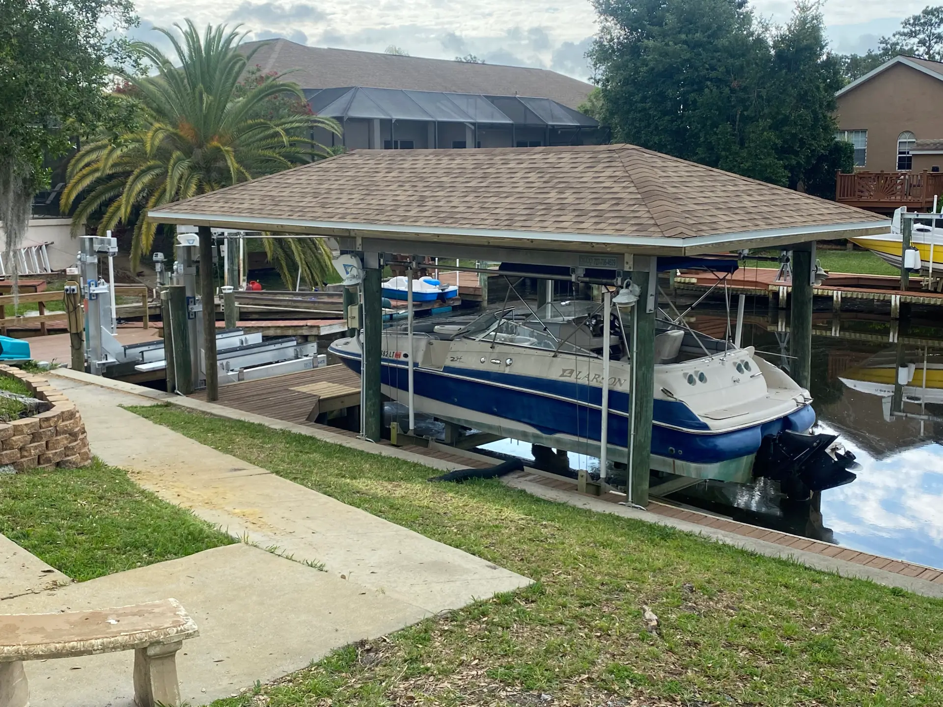 Maritime boathouse repairing on the wooden deck