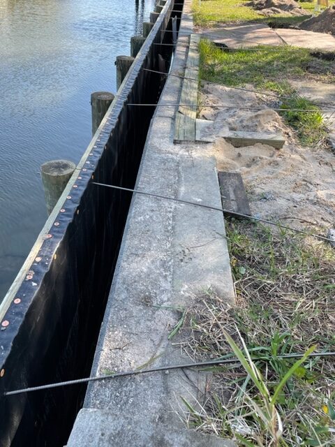 Maritime seawalls with bulkhead installation